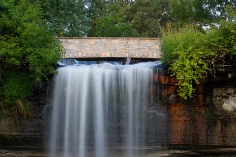 Waterfall and bridge Stock Photos