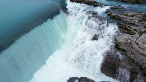 Waterfall and cascade on a mountain river. Powerful stream of water Stock Footage 153398065