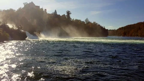 Waterfall and drops scatter on Rhine Falls in Switzerland. 4K Stock Footage 255711937