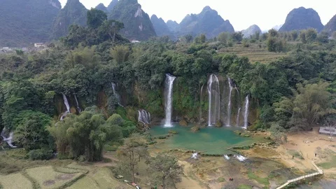 Waterfall and Mountains Ban Gioc Vietnam Aerial Drone Video Stock Footage 124355140