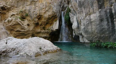 Waterfall and natural pool Stock Footage 67998237