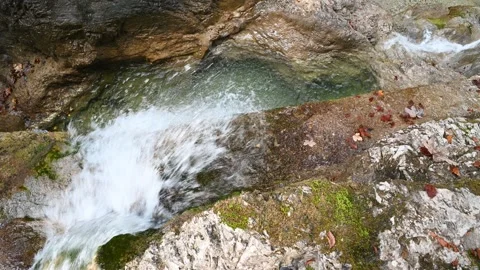 A waterfall and a pond of a mountain stream in autumn Video stock 260863884