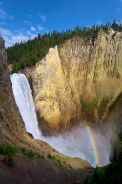 Waterfall and rainbow Stock Photos