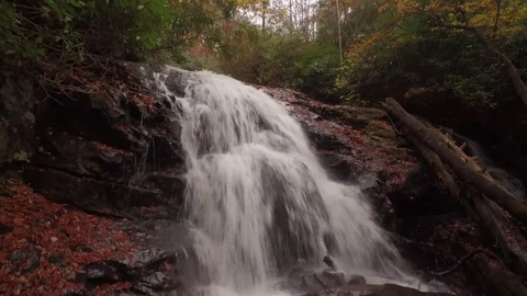 Waterfall and river in autum Stock Footage 84943665
