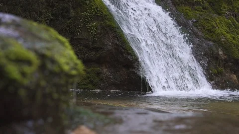 Waterfall and river with musk, medium shot, slow motion Stock Footage 88844618
