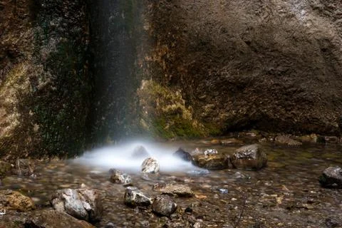 Waterfall and rocks Stock Photos