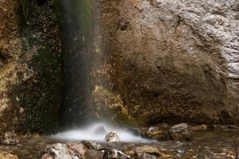 Waterfall and rocks Stock Photos