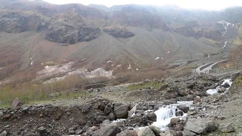 Waterfall and streams in volcanic valley in North Slope Scenic Area of Changb Stock Footage 136528560