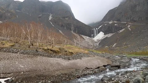 Waterfall and streams in volcanic valley in North Slope Scenic Area of Changb Stock Footage 136528569