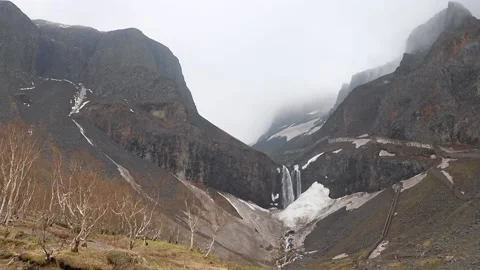 Waterfall and streams in volcanic valley in North Slope Scenic Area of Changb Stock Footage 136528580