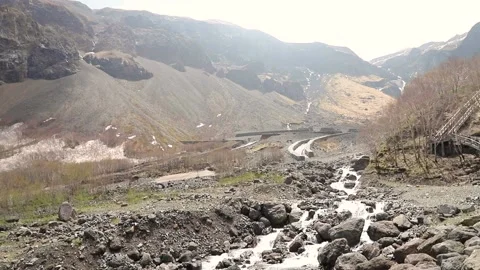 Waterfall and streams in volcanic valley in North Slope Scenic Area of Changb Stock Footage 136528587
