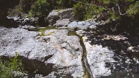 Waterfall and trickle path Stock Footage 78247103
