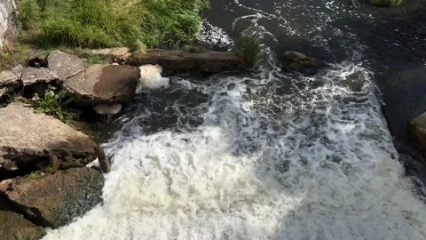 Waterfall and view from bridge at Belmotas in Vilnius, Lithuania Stock Footage 214045278