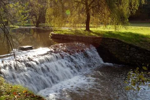 Waterfall  in the autumn forest Foto stock