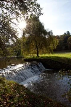 Waterfall  in the autumn forest Stock Photos