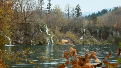 Waterfall autumn leaves trees Stock Footage 106529193