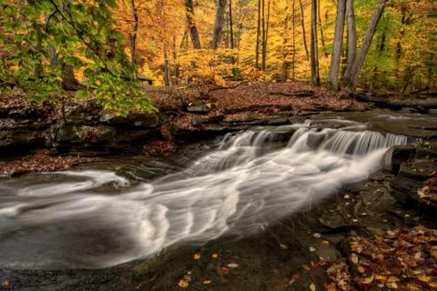 Waterfall in autumn Stock Photos