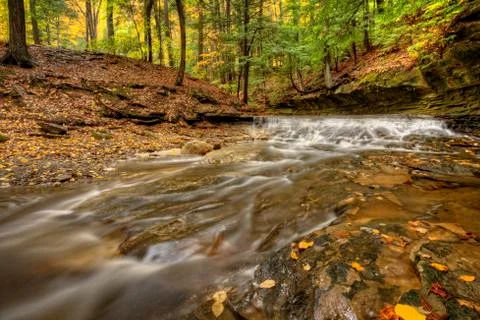 Waterfall in autumn Stock Photos