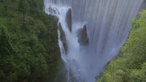 Waterfall in Barcis lake at sunset Stock Footage 78009352