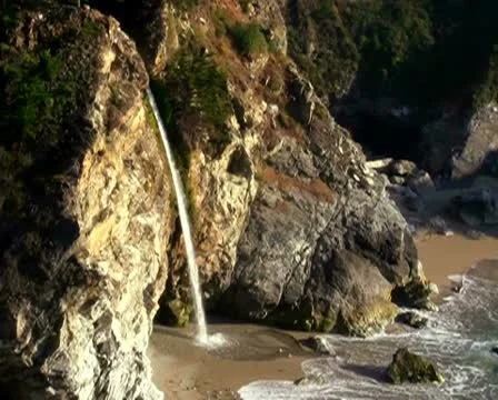 Waterfall on beach V3 - PAL Video stock 10721588