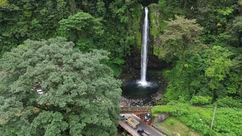 Waterfall Beside the Road Stock Footage 258730981