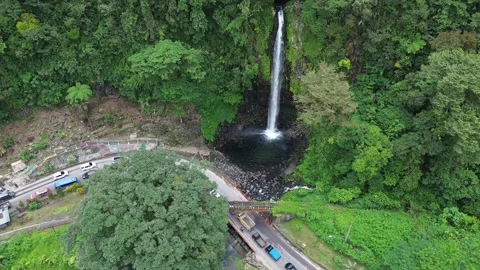 Waterfall Beside the Road Stock Footage 258735117