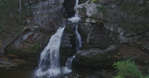 A waterfall between rocks Stock Footage 144985372