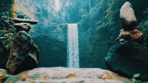 Waterfall between stone towers Stock Footage 92175830
