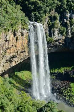 Waterfall between trees and rocks, Gramado-Canela, Brazil Stock Photos
