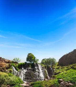 Waterfall with blue sky Fotos de archivo