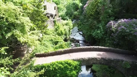 Waterfall-bridge-old-mill-summer-scenery-4k-1 Stock-Footage 310945140