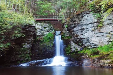 Waterfall with bridge Stock Photos
