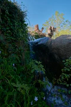 Waterfall on a bright spring morning Stock Photos