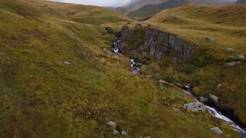Waterfall cascade in the mountains Stock Footage 237871052