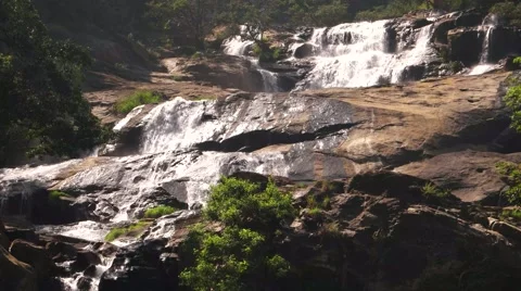 Waterfall cascade on sunny day. Bottom view. Sri Lanka. Stock Footage 61843251