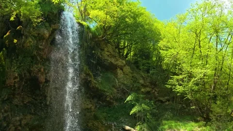 Waterfall cascades down mossy rocks. Gostilje Waterfall, Serbia. Stock Footage 337060210