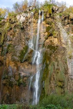 Waterfall Cascading Down Limestone Cliffs in Plitvice Lakes National Park, .. Stock Photos