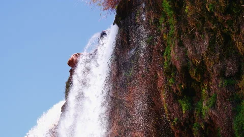 Waterfall cascading down the mountainside Stock Footage 148027527
