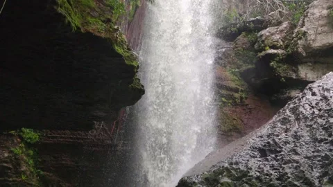 Waterfall Cascading Over Mossy Rocks in Guaviare Stock Footage 336521206