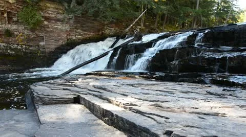 Waterfall cascading over the rocks Stock Footage 20611825