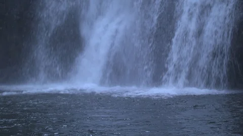 Waterfall Cascading into the River Below Stock Footage 91273750