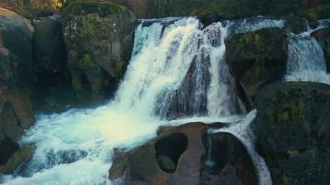 Waterfall Cascading Through Boulders Stock Footage 264632797