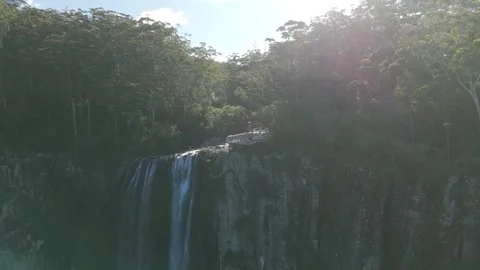Waterfall Cascading Through Misty Forest Landscape Stock Footage 341599050