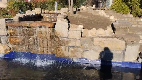 Waterfall Cascading Water Flowing Over Rocks Cliff Pond River Creek Urban City Stock Footage 302895437