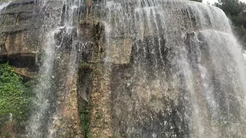 Waterfall at Castle Hill park. Motion of running water. Nice, France Stock Footage 265257448
