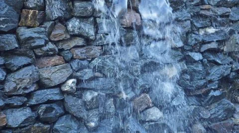 Waterfall in the city. Stock Photos