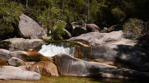 The waterfall at Cleopatra's Pool Able Tasman National Park, New Zealand. Stock Footage 145705837