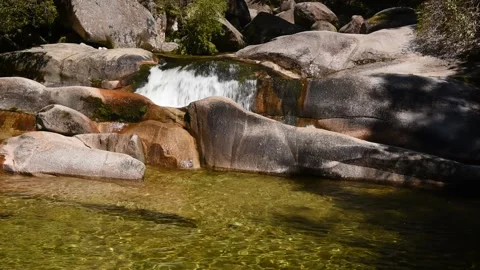 The waterfall at Cleopatra's Pool, Able Tasman National Park, New Zealand. Stock Footage 148448287