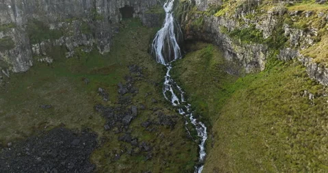 Waterfall on a cliff edge Stock Footage 276194234
