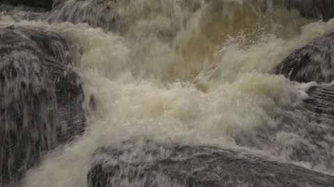 Waterfall. Close up of water flowing over rocks in slow motion Stock Footage 86830637